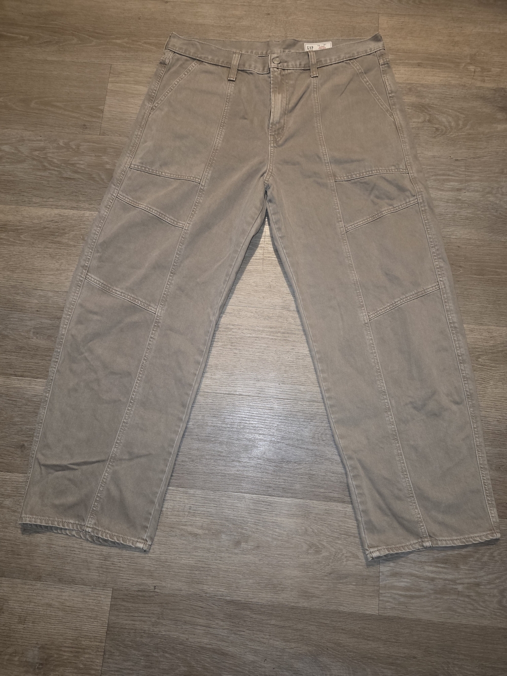 These are the Gap Women's High Rise Barrel Jeans in a khaki/tan wash.